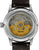 Reloj Seiko Presage para hombre con fondo de caja transparente, movimiento automático en tono dorado y correa de cuero marrón.