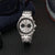 Reloj de hombre con pulsera de acero inoxidable plateado, cronógrafo redondo con esfera negra