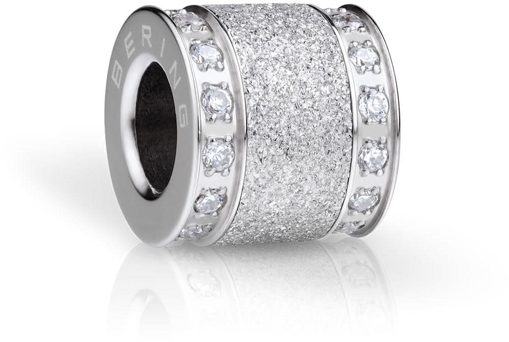 Charm de acero inoxidable con cuerpo cilíndrico brillante y pequeñas piedras decorativas en los bordes