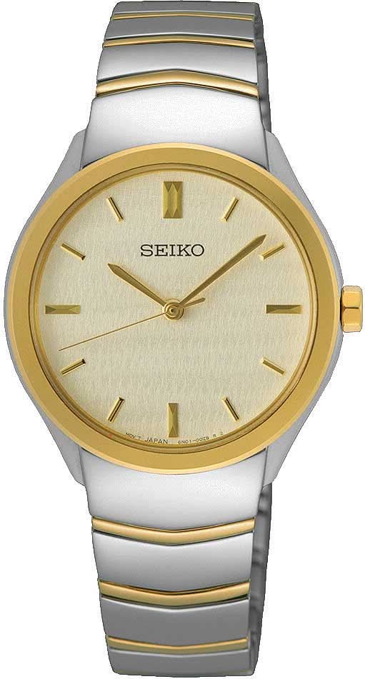 "Reloj de mujer con pulsera de metal bicolor y esfera en tono oro rosa, marcadores dorados"