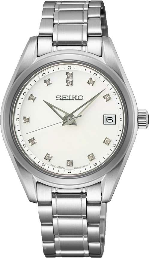 Reloj Seiko para mujer con correa de acero inoxidable plateada, esfera blanca, fecha a las 6