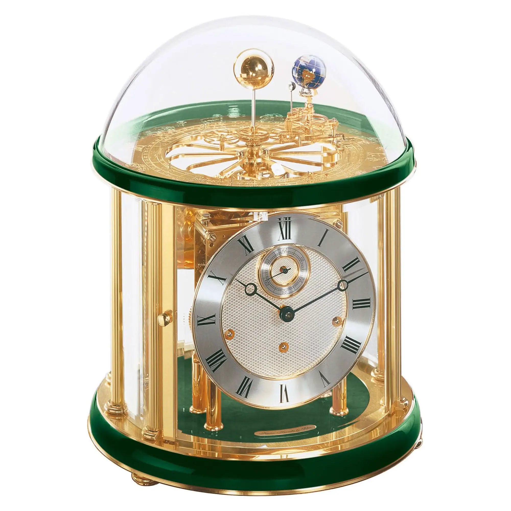 Reloj de mesa mecánico con campana de cristal, caja dorada, base verde y esfera romana