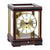 Reloj de mesa de caoba con marco de cristal, esfera dorada y números romanos