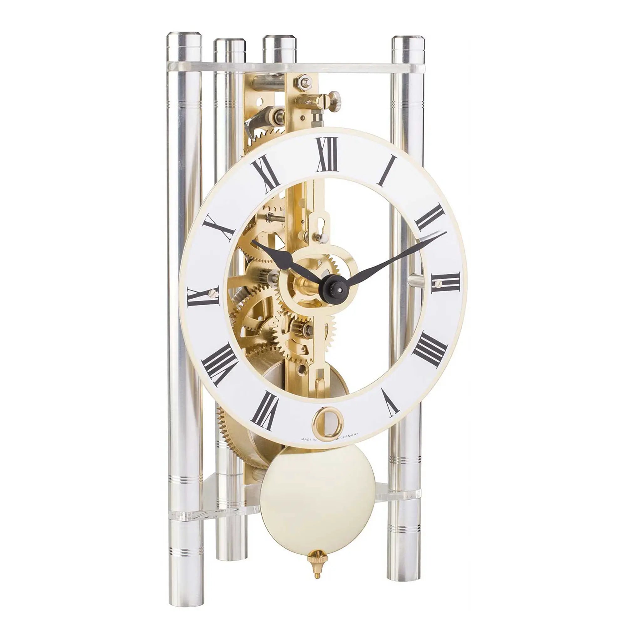 Reloj de mesa mecánico con estructura transparente plateada, movimiento expuesto y números romanos