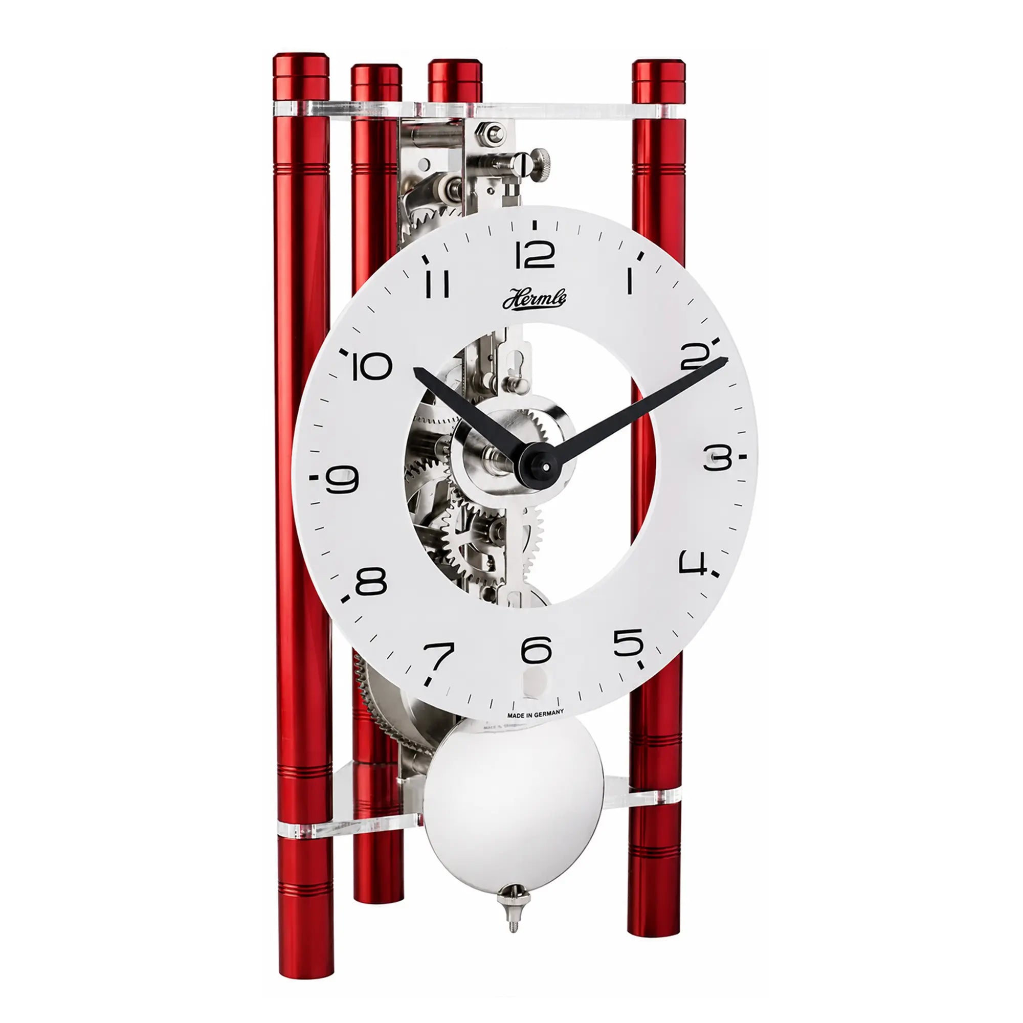 Reloj de mesa esqueleto con esfera blanca, mecanismo visible y pilares rojos