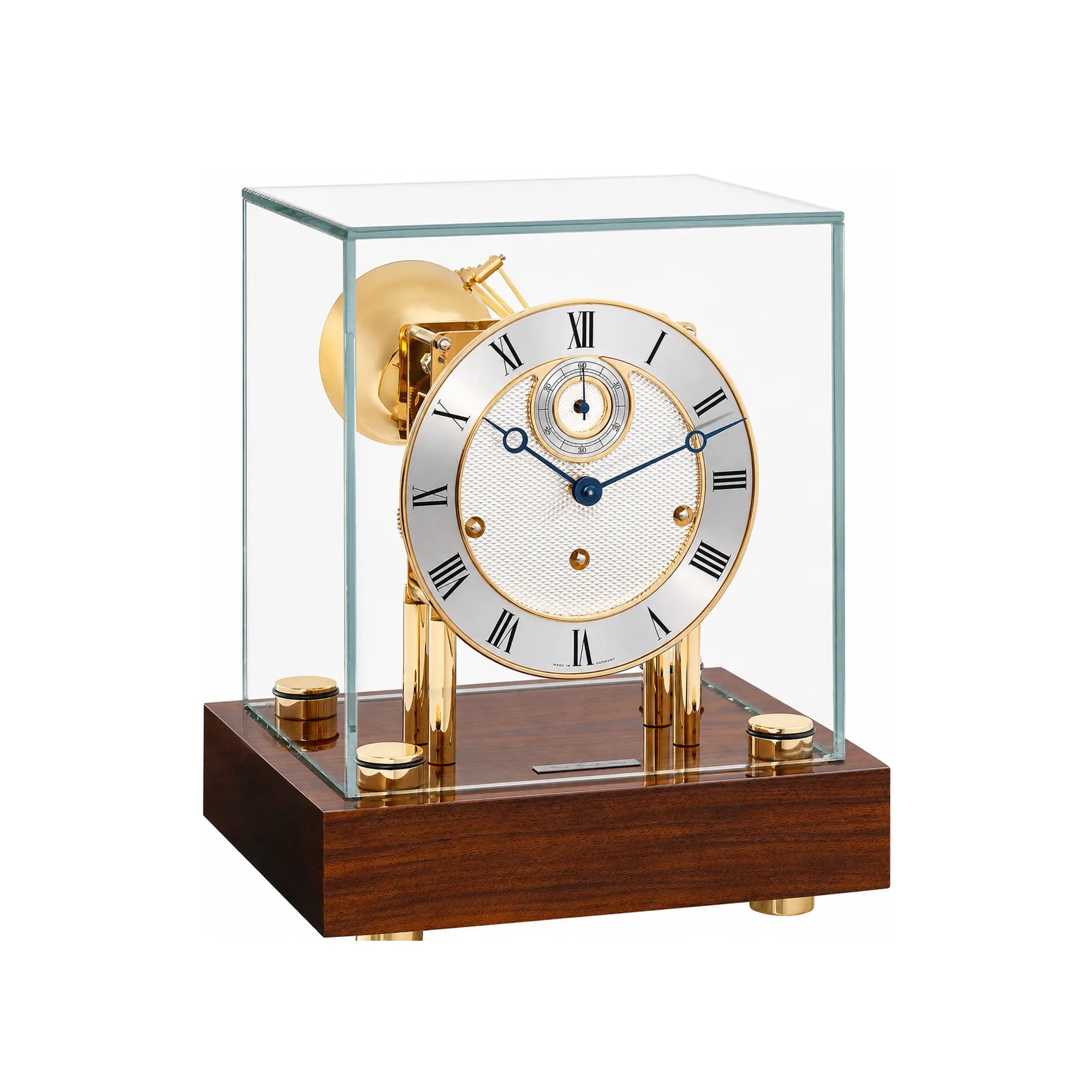 Reloj de mesa en caja de cristal con esfera blanca y base de nogal