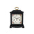 Reloj de mesa negro con esfera floral y asa dorada, cuerda mecánica