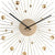 Nahaufnahme: Karlsson Sunburst-Wanduhr mit goldener Ziffernplatte und Kugeln