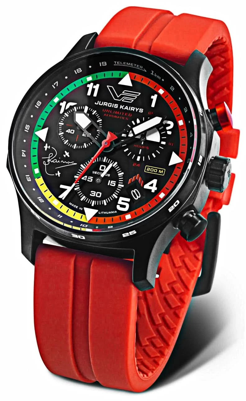 Reloj de hombre con correa textil roja, esfera negra con índices luminosos y aspecto cronógrafo