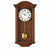 Wanduhr im Nussbaumgehäuse mit römischem Ziffernblatt und Pendel