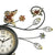 Runde Wanduhr mit schwarzem Metallrahmen, Zierblumen und Schmetterlingen, AMS