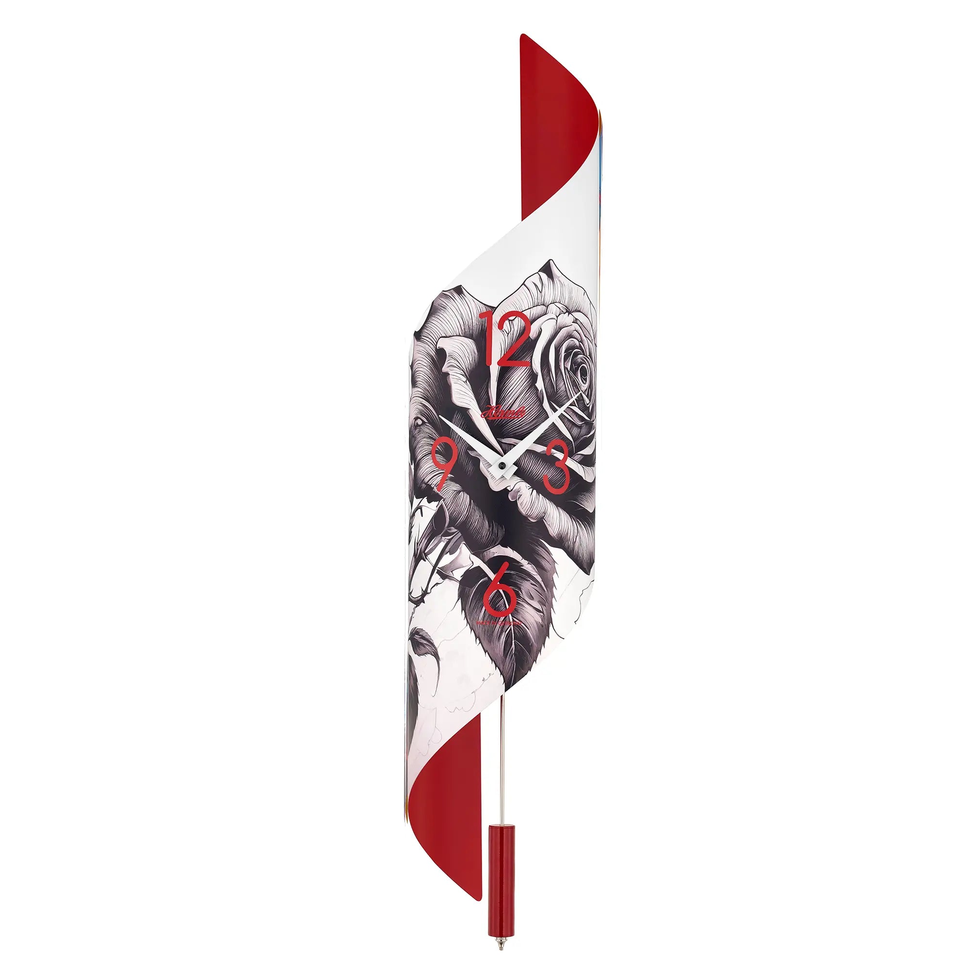 Reloj de pared con esfera blanca, formas a medias rojas y estampado negro