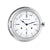 Reloj de mesa analógico redondo con esfera blanca, números romanos y manecillas azules