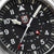 Esfera de reloj para hombre negra con logo LUMINOX, detalles rojos e índices horarios