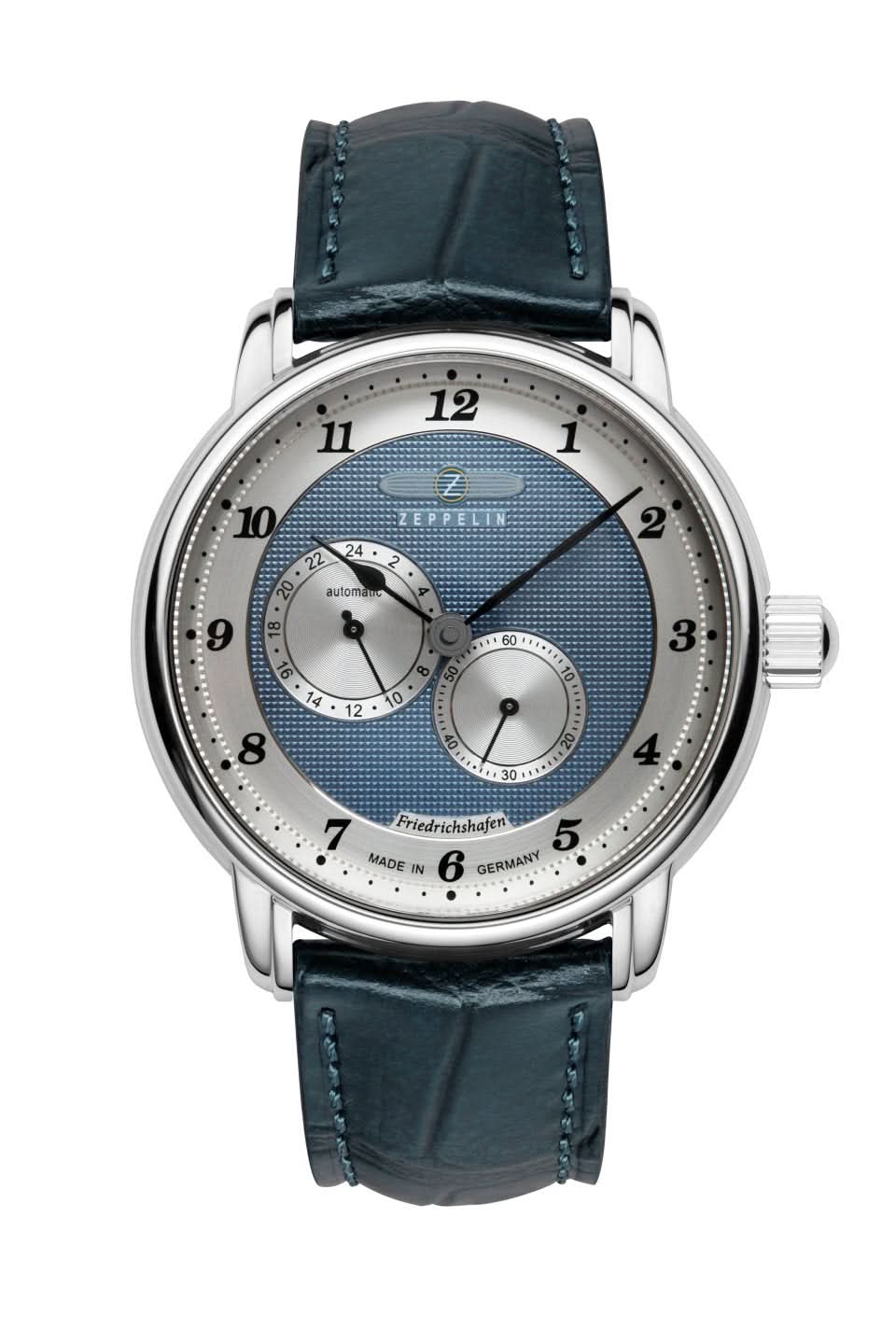Reloj de hombre con correa de cuero azul oscuro, caja plateada y esfera azul con subesferas
