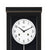 Esfera de reloj de pared con manecillas negras e indicación de marca, rodeada por un marco negro