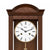 Esfera de reloj de pared con números romanos, manecillas negras y anillo de latón