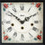 Vista frontal del reloj de mesa: esfera blanca con números romanos y borde floral