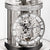 Reloj de mesa con campana de cristal, mecanismo de metal delicado y números romanos