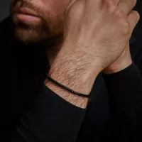 Pulsera negra de piedra de ónix en forma de disco...